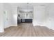 Modern kitchen with stainless steel appliances, contrasting cabinetry, and sleek countertops at 1448A Maplewood Dr, Durham, NC 27704