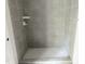 Walk-in shower with tiled walls and base at 1448A Maplewood Dr, Durham, NC 27704
