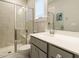 Modern bathroom featuring a glass-enclosed shower and neutral vanity with a sink at 1517 Millrock Trl, Wendell, NC 27591