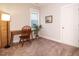 Bedroom with a desk, chair, carpet, and a lamp and a window that provides ample light at 1517 Millrock Trl, Wendell, NC 27591