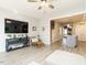 Living room with modern decor and an open floor plan that flows into the kitchen at 1517 Millrock Trl, Wendell, NC 27591