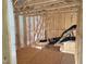 Unfinished attic featuring exposed framing, plywood flooring and ductwork at 152 Cultivator Ct, Angier, NC 27501