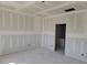 Ready to be styled bedroom with a corner window to let the sun in at 152 Cultivator Ct, Angier, NC 27501