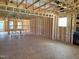 Unfinished living room framing with views of the new construction's open layout and fireplace at 152 Cultivator Ct, Angier, NC 27501