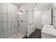 Modern bathroom with a glass-enclosed shower, sleek fixtures, bright lighting, and tile flooring at 1616 Hunting Ridge Rd, Raleigh, NC 27615