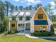 Charming two-story home with a modern farmhouse design with wooden accents at 1616 Hunting Ridge Rd, Raleigh, NC 27615