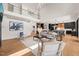 Open-concept living spaces connecting the kitchen, living, and dining area with modern decor at 1616 Hunting Ridge Rd, Raleigh, NC 27615