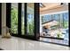 Kitchen with large sliding glass doors leading to outdoor patio at 1616 Hunting Ridge Rd, Raleigh, NC 27615