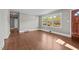 Open living area with large windows, offering ample natural light and views of the outdoors at 1802 Prince Edward Dr, Elon, NC 27244