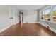 Sunlit living room features stylish flooring and neutral walls, offering a bright and inviting space at 1802 Prince Edward Dr, Elon, NC 27244