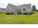 Exterior of a home with a well-maintained lawn and landscaped shrubs in the backyard at 192 Ash Lily Ct, Nashville, NC 27856