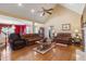 Spacious living room with high ceilings, hardwood floors, and comfortable leather sofas at 192 Ash Lily Ct, Nashville, NC 27856
