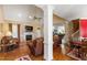 Spacious living room with a fireplace, hardwood floors, and comfortable leather furniture at 192 Ash Lily Ct, Nashville, NC 27856