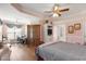 Spacious main bedroom features a tray ceiling, a ceiling fan, and wood laminate floors at 192 Ash Lily Ct, Nashville, NC 27856