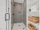 Sleek walk-in shower with stylish tile and convenient shelving at 2019 James St, Durham, NC 27707