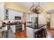 Spacious kitchen offers an island with seating, stainless steel appliances, and plenty of counter space at 205 Lippershey Ct, Cary, NC 27513