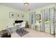 Bright office with dual monitor setup and a stylish desk at 205 Lippershey Ct, Cary, NC 27513