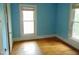 Bedroom with hardwood floors and natural light at 223 S Main St, Wendell, NC 27591