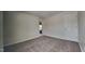 Cozy bedroom featuring neutral carpet, closet, and ample natural light at 2428 Diquedo Dr, Raleigh, NC 27604