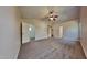 Large main bedroom featuring a vaulted ceiling, ceiling fan, and neutral carpeting at 2428 Diquedo Dr, Raleigh, NC 27604