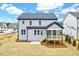 Exterior shot of a house featuring a back porch and newly mulched backyard at 2437 Terri Creek Dr, Fuquay Varina, NC 27526