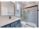 Well-appointed bathroom with a vanity, toilet, and glass-enclosed shower, providing a relaxing retreat at 2437 Terri Creek Dr, Fuquay Varina, NC 27526