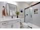 Beautiful bathroom featuring a glass enclosed shower and modern vanity at 2437 Terri Creek Dr, Fuquay Varina, NC 27526