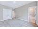 Spacious bedroom with a walk-in closet and ensuite bathroom, offering a private and convenient space at 2437 Terri Creek Dr, Fuquay Varina, NC 27526
