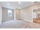 Cozy bedroom with plenty of space, access to the ensuite bathroom, and large windows, creating a calm retreat at 2437 Terri Creek Dr, Fuquay Varina, NC 27526