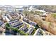 Overhead view displaying townhomes, mature trees, and a serene community landscape from above at 2507 Princewood St, Raleigh, NC 27612