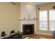 Living room fireplace with a decorative mantel and a marble surround at 2507 Princewood St, Raleigh, NC 27612