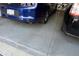 Epoxy garage floor in a clean and organized two-car garage at 2507 Princewood St, Raleigh, NC 27612