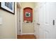 Hallway with hardwood floors, doorways and an alcove for displaying décor at 2507 Princewood St, Raleigh, NC 27612