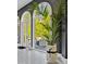 Arched windows overlooking deck with scenic outdoor views, with modern decor at 25303 Ludwell, Chapel Hill, NC 27517