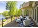 Large backyard deck with outdoor seating and lake views at 25303 Ludwell, Chapel Hill, NC 27517