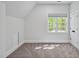 Bright, airy bedroom with natural light and soft carpet flooring creating a peaceful retreat at 25303 Ludwell, Chapel Hill, NC 27517