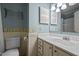 Bathroom with light-blue walls, white vanity, and a toilet with floral accents at 3100 Coachmans Way, Durham, NC 27705