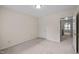 Bright bedroom features neutral walls and soft carpet, offering a comfortable and versatile space at 3100 Coachmans Way, Durham, NC 27705
