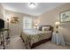 Cozy bedroom with a comfortable bed, natural light, and side tables at 3100 Coachmans Way, Durham, NC 27705