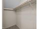 A simple closet with a rod for hanging clothes offers practical storage at 3100 Coachmans Way, Durham, NC 27705