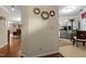 Open kitchen with stainless steel appliances, breakfast nook, and views of the connecting living area at 3100 Coachmans Way, Durham, NC 27705