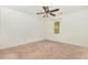 Bedroom with neutral walls, carpet, a ceiling fan, and a window at 3109 E Folkestone Pl, Raleigh, NC 27604