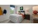 Charming bedroom with comfortable bed, side table, and ample natural light at 320 Hanging Elm Ln, Fuquay Varina, NC 27526