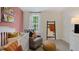 Charming Bedroom with a rocking chair, crib and decorative accessories at 320 Hanging Elm Ln, Fuquay Varina, NC 27526