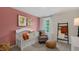Cozy Bedroom featuring a crib, chair, and accent ladder with throws at 320 Hanging Elm Ln, Fuquay Varina, NC 27526