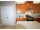 Bright kitchen showcasing wood cabinets, modern appliances, and a spacious island at 3219 Ranbir Dr, Durham, NC 27713