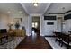Elegant entryway showcasing dark hardwood floors, decorative accents, and a view into the living spaces at 33 Blackhorn Ct, Pittsboro, NC 27312