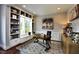 Bright office with custom built-ins, a large window seat, and a stylish work desk at 33 Blackhorn Ct, Pittsboro, NC 27312