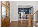 Elegant dining room featuring hardwood floors, modern lighting and stylish decor at 3513 Forest Oaks Dr, Chapel Hill, NC 27514