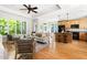 Spacious living room and kitchen offers hardwood floors, recessed lights, and natural light at 3513 Forest Oaks Dr, Chapel Hill, NC 27514